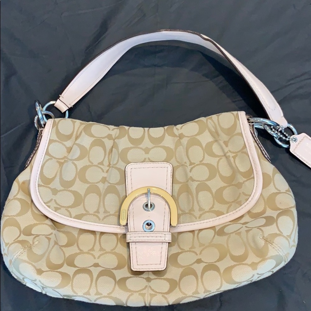 Tan and light pink accent shoulder Coach purse